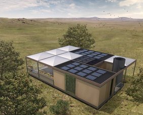 Luftansicht: Plusenergiehaus aus nachhaltigen Materialien